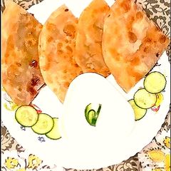 Green Dhaniya masalydar paratha 😋😋😋😋 A picture of Green Dhaniya masalydar paratha 😋😋😋😋.