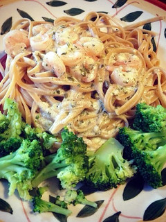 A picture of Creamy Pesto Alfredo With Shrimp and Linguini.