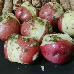 A picture of Herbed New Potatoes.