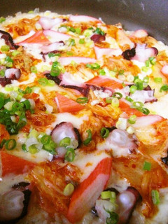 A picture of Seafood Kimchi Rice Pizza.