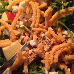 A picture of Summer Arugula tossed with Chicken, Goat Cheese, & Apple.