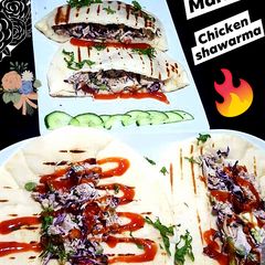 A picture of Pita bread chicken Shawarma 🌮🥙🌯.