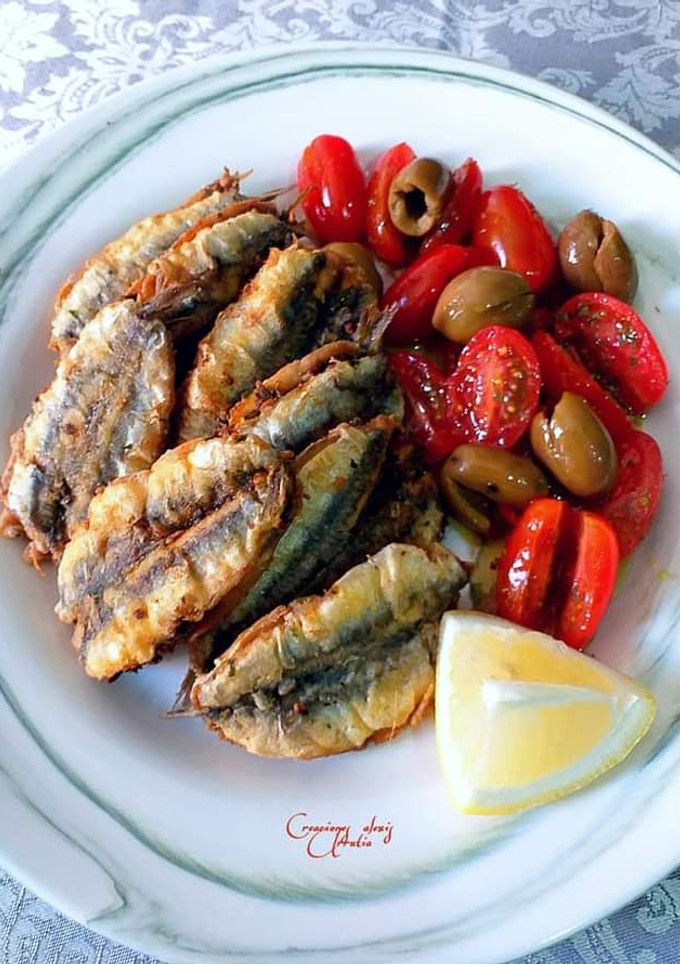 Una foto de Boquerones con picada, fritos en harina de garbanzos