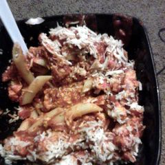 A picture of three cheese chicken penne pasta.
