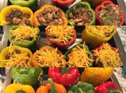 A picture of cheesy chicken stuffed peppers