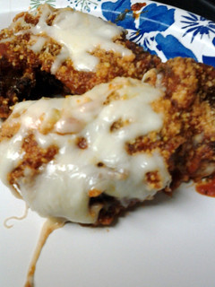 A picture of chicken fingers parmesan.