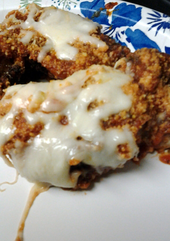 A picture of chicken fingers parmesan.