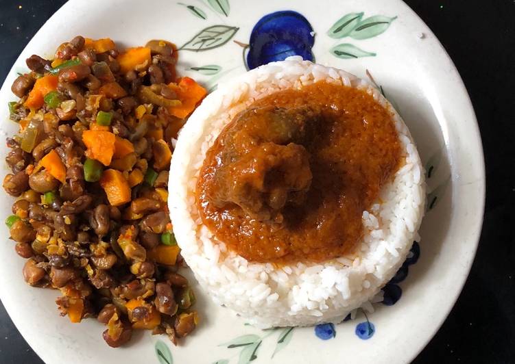 Rice and stew served with veggie beans