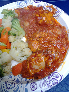 A picture of Stewed chicken in tomatoes.