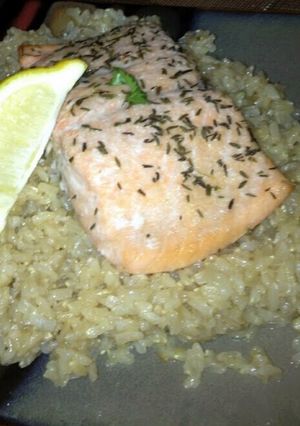 A picture of salmon and brown rice.