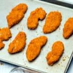 A picture of Dorito crusted chicken fingers.