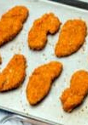 A picture of Dorito crusted chicken fingers.