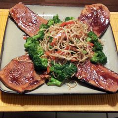 vegan honey barbaque fish with vegetable lomain noodles A picture of vegan honey barbaque fish with vegetable lomain noodles.