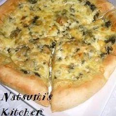 Soft and Fluffy Bread Machine Pizza Dough with Pesto Genovese Sauce A picture of Soft and Fluffy Bread Machine Pizza Dough with Pesto Genovese Sauce.