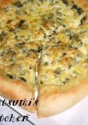 A picture of Soft and Fluffy Bread Machine Pizza Dough with Pesto Genovese Sauce.