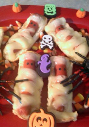 A picture of halloweenies mummies.