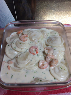 Una foto de Sorrentinos con camarones