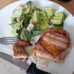 A picture of Bacon wrapped pork chops.