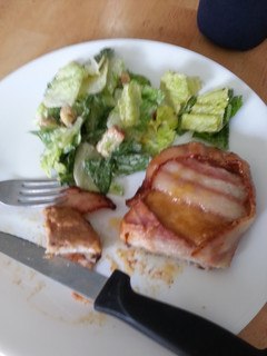 A picture of Bacon wrapped pork chops.