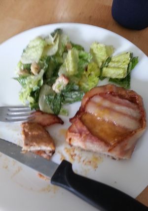 A picture of Bacon wrapped pork chops.