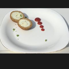A picture of Chicken scotch eggs.