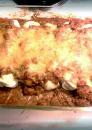 A picture of Chili dog enchiladas.