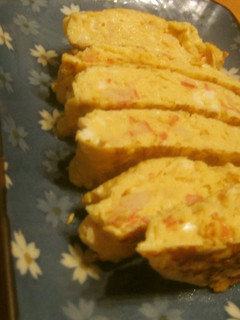 A picture of Umami-Rich Fluffy Dashimaki Tamago With Crabsticks and Mentsuyu Sauce.