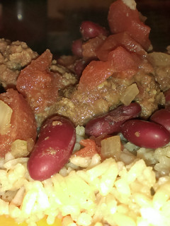 A picture of Cube steak and beans.