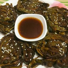 A picture of Arbi patra roll (patod).