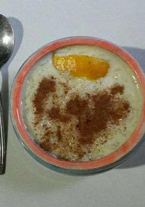 Una foto de Arroz con leche y cáscaras de naranja 🍊