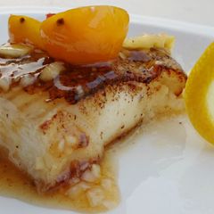 A picture of Pan Fried Hallibut In Pineapple Plum Sauce.