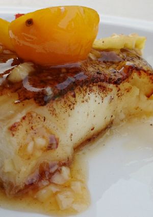 A picture of Pan Fried Hallibut In Pineapple Plum Sauce.