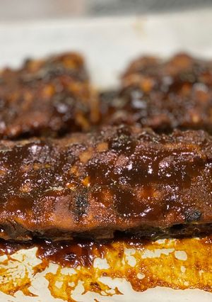 A picture of Stove Top Pressure Cooker Baby Back Ribs — BBQ sauce.