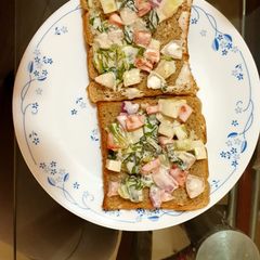 A picture of Open salad sandwiches.