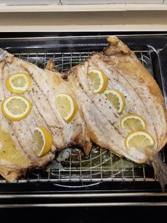 Una foto de Lubina al horno