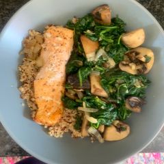 A picture of Baked Salmon with spinach and mushroom.