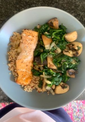 A picture of Baked Salmon with spinach and mushroom.
