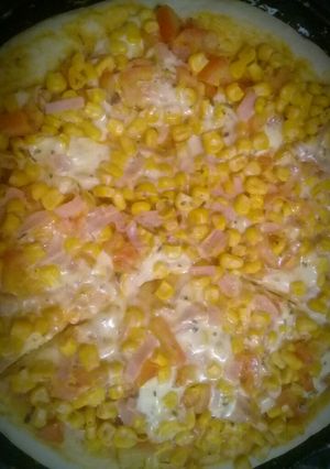Una foto de Pizza de choclo 🍕 🌽