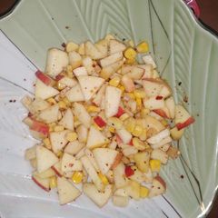 A picture of Apple and corn salad.