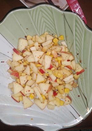 A picture of Apple and corn salad.
