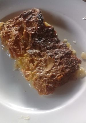 Una foto de Budín de pan con manzanas