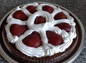 Una foto de Torta con peras al Borgoña