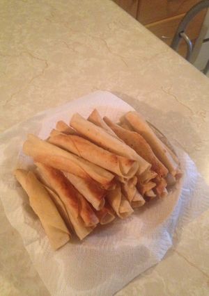 Una foto de Tacos dorados