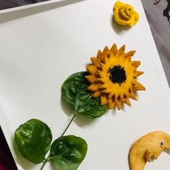A picture of Sunflower shaped mathri.