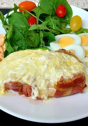 A picture of Bacon Wrapped around Chicken breast with soft Smoked Cheese 🤩.