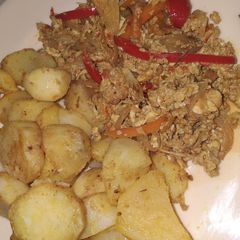 A picture of Potatoes with egg source.