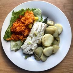 A picture of Baked Cod with Asparagus and Potatoes.