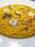 RISOTTO CON CREMA DI ZUCCA,GAMBERI E VONGOLE