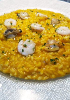 Foto di RISOTTO CON CREMA DI ZUCCA,GAMBERI E VONGOLE