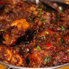 A picture of Kerala Style Pepper chicken.